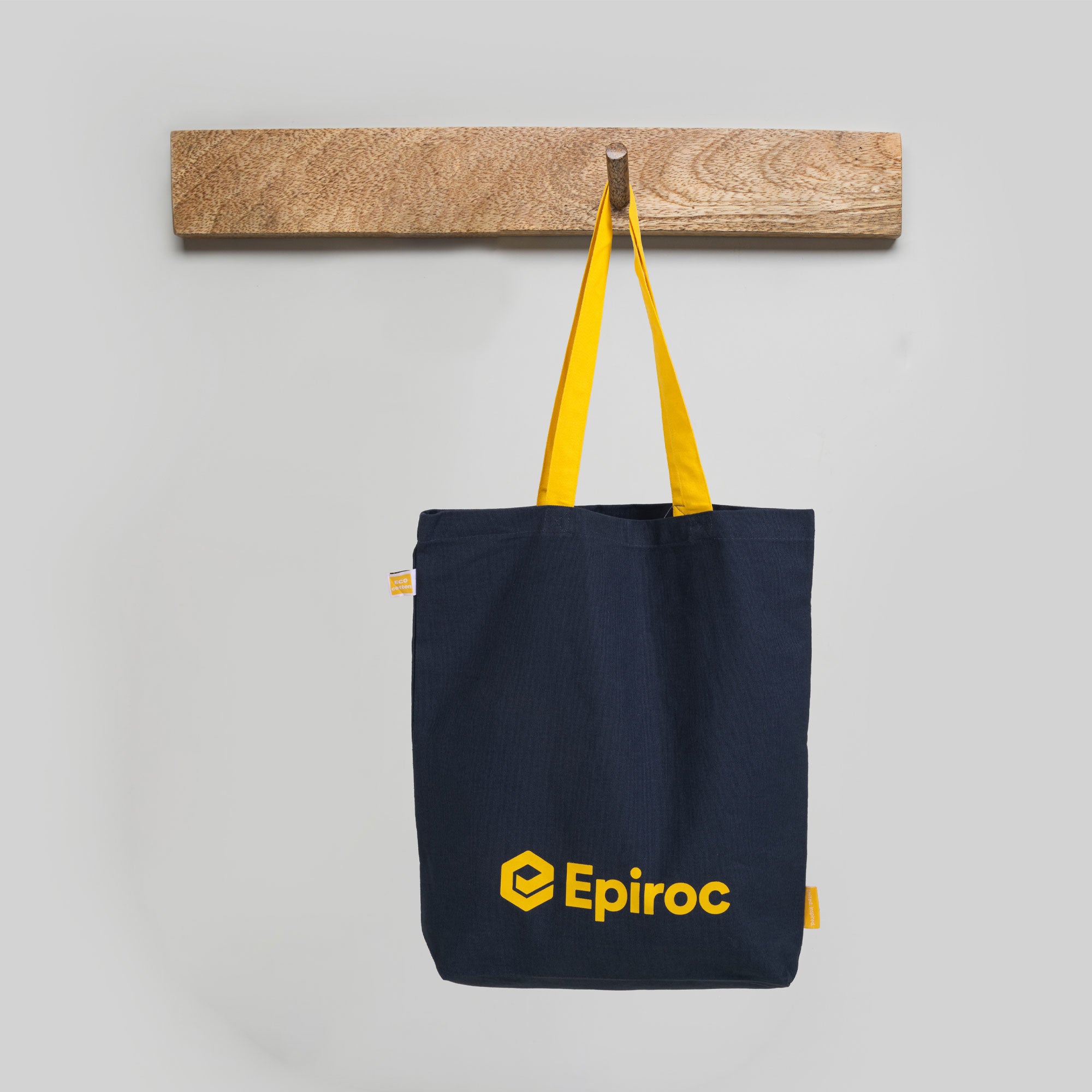 grey tote bag with yellow epiroc logo and straps